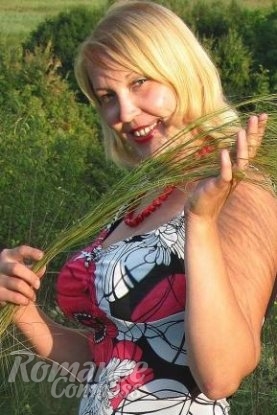 Ukrainian mail order bride Marusja from Kropyvnytskyi with blonde hair and hazel eye color - image 1