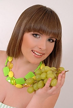 Ukrainian girl Alina,36 years old with blue eyes and light brown hair.