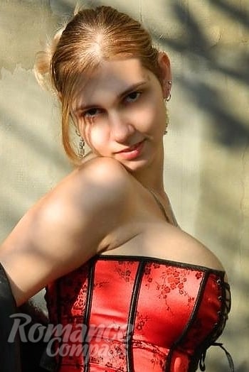 Ukrainian mail order bride Svetlana from Nikolaev with light brown hair and black eye color - image 1