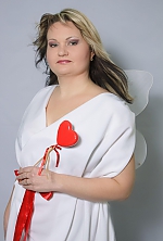 Ukrainian mail order bride Olga from Nikolaev with light brown hair and green eye color - image 3