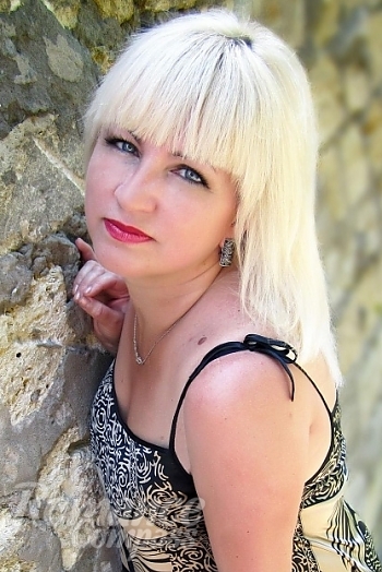 Ukrainian mail order bride Raisa from Nikolaev with blonde hair and grey eye color - image 1