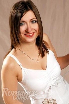 Ukrainian mail order bride Yulia from Zaporozhye with light brown hair and green eye color - image 1
