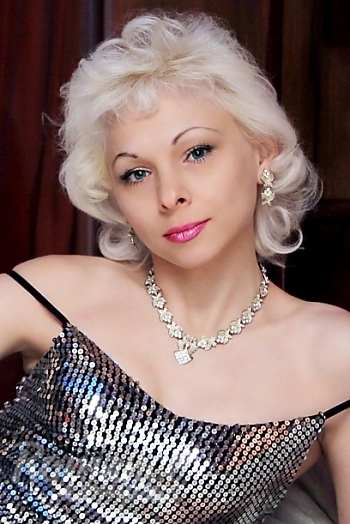 Ukrainian mail order bride Tatyana from Nikolaev with blonde hair and blue eye color - image 1