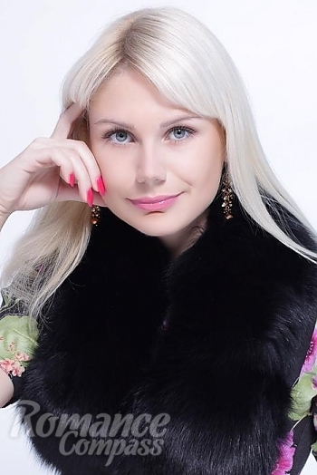 Ukrainian mail order bride Juliya from Kiev with blonde hair and blue eye color - image 1