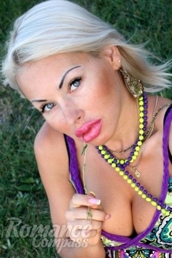 Ukrainian mail order bride Olesya from Odessa with blonde hair and blue eye color - image 1