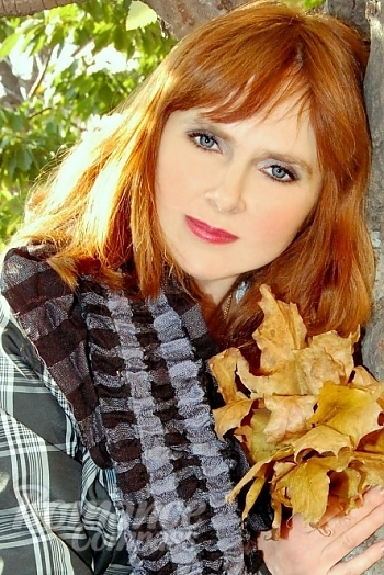 Ukrainian mail order bride Tatyana from Lugansk with red hair and grey eye color - image 1