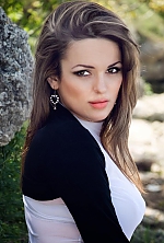 Ukrainian mail order bride Lilia from Nikolaev with brunette hair and green eye color - image 6
