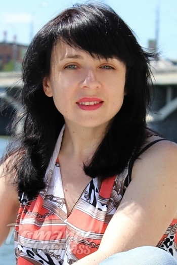 Ukrainian mail order bride Irina from Vinnitsa with black hair and green eye color - image 1