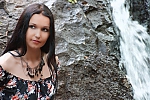 Ukrainian mail order bride Lyudmila from Lugansk with brunette hair and green eye color - image 9