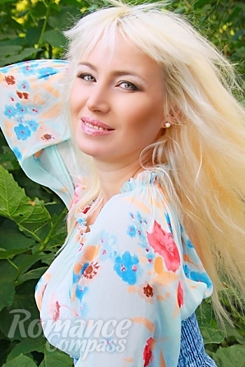 Ukrainian mail order bride Natalia from Poltava with blonde hair and green eye color - image 1