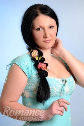Ukrainian mail order bride Svetlana from Nikolaev with black hair and hazel eye color - image 1