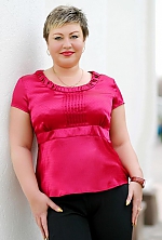 Ukrainian mail order bride Ksenia from Chuguev with light brown hair and green eye color - image 6