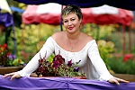 Ukrainian mail order bride Ksenia from Chuguev with light brown hair and green eye color - image 3
