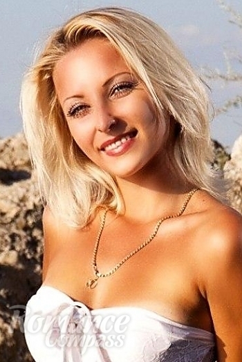 Ukrainian mail order bride Yulia from Ochakov with blonde hair and green eye color - image 1