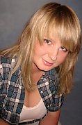 Ukrainian girl Anna,35 years old with blue eyes and blonde hair.