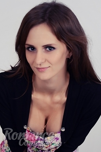 Ukrainian mail order bride Ulia from Nikolaev with light brown hair and blue eye color - image 1