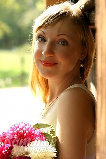 Ukrainian mail order bride Tatiana from Zaporozhye with blonde hair and blue eye color - image 1