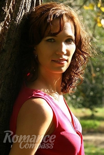 Ukrainian mail order bride Olga from Zaporozhye with light brown hair and green eye color - image 1