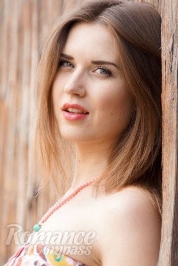 Ukrainian mail order bride Olga from Harkov with light brown hair and green eye color - image 1