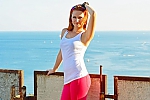 Ukrainian mail order bride Olga from Simferopol with red hair and green eye color - image 4