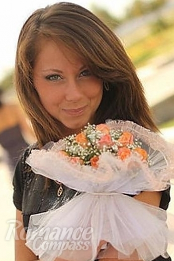 Ukrainian mail order bride Anna from Sumy with light brown hair and green eye color - image 1