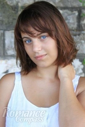 Ukrainian mail order bride Anastasia from Odessa with brunette hair and blue eye color - image 1