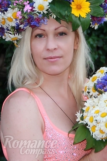 Ukrainian mail order bride Natalya from Yalta with blonde hair and blue eye color - image 1