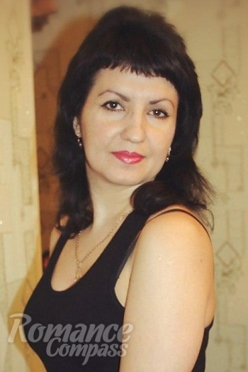 Ukrainian mail order bride Antonina from Voznesensk with black hair and hazel eye color - image 1