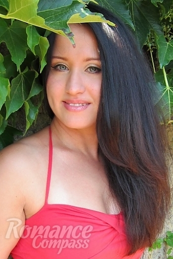 Ukrainian mail order bride Ekaterina from Yalta with black hair and blue eye color - image 1