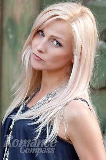 Ukrainian mail order bride Natalia from Poltava with blonde hair and blue eye color - image 1