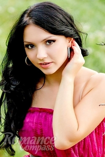 Ukrainian mail order bride Anastasia from Poltava with black hair and hazel eye color - image 1