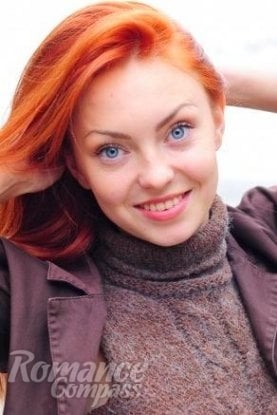 Ukrainian mail order bride Mar'ya from Novaya Kakhovka with red hair and blue eye color - image 1