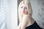 Ukrainian mail order bride Tatjana from Nikopol with blonde hair and blue eye color - image 5