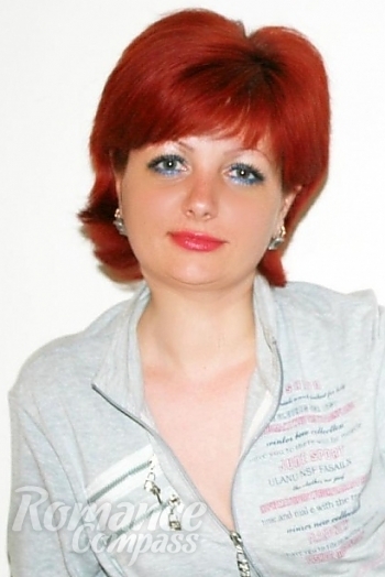 Ukrainian mail order bride Natalia from Nikolaev with red hair and green eye color - image 1