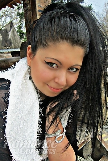 Ukrainian mail order bride Svetlana from Nikolaev with black hair and hazel eye color - image 1