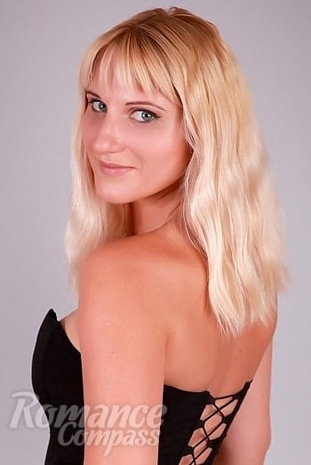 Ukrainian mail order bride Kira from Simferopol with blonde hair and grey eye color - image 1