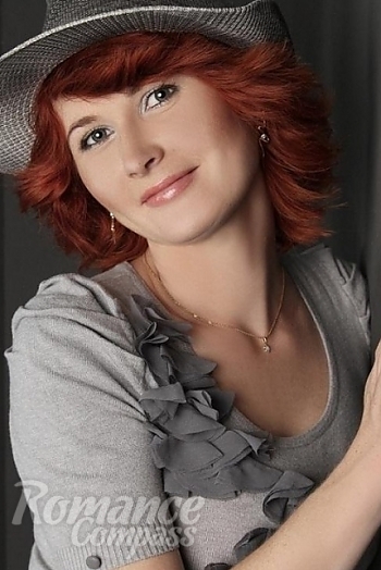 Ukrainian mail order bride Olga from Simferopol with red hair and green eye color - image 1