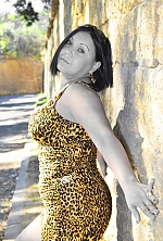 Ukrainian mail order bride Veronika from Nikolaev with black hair and green eye color - image 5