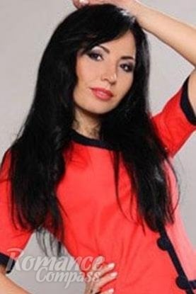 Ukrainian mail order bride Christina from Odessa with black hair and brown eye color - image 1