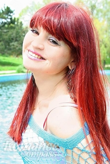 Ukrainian mail order bride Alla from Odessa with red hair and brown eye color - image 1