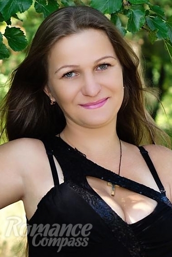 Ukrainian mail order bride Anna from Nikolaev with light brown hair and grey eye color - image 1