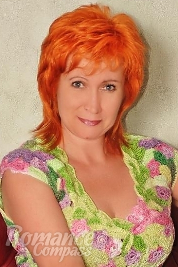 Ukrainian mail order bride Valeriya from Nikolaev with red hair and blue eye color - image 1