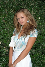 Ukrainian mail order bride Oksana from Yalta with light brown hair and green eye color - image 6