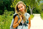 Ukrainian mail order bride Oksana from Yalta with light brown hair and green eye color - image 5
