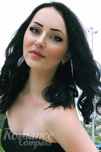 Ukrainian mail order bride Irina from Marinka with light brown hair and green eye color - image 1