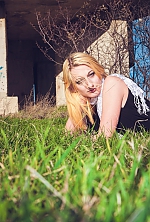 Ukrainian mail order bride Anastasia from Yalta with blonde hair and blue eye color - image 4