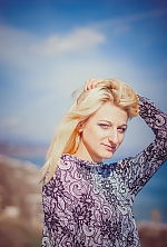 Ukrainian mail order bride Anastasia from Yalta with blonde hair and blue eye color - image 5