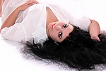 Ukrainian mail order bride Aliona from Zhytomyr with black hair and green eye color - image 3
