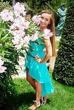 Ukrainian mail order bride Anna from Yalta with light brown hair and green eye color - image 4