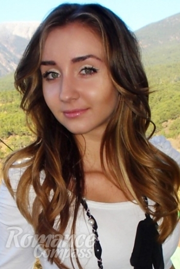 Ukrainian mail order bride Anna from Yalta with light brown hair and green eye color - image 1